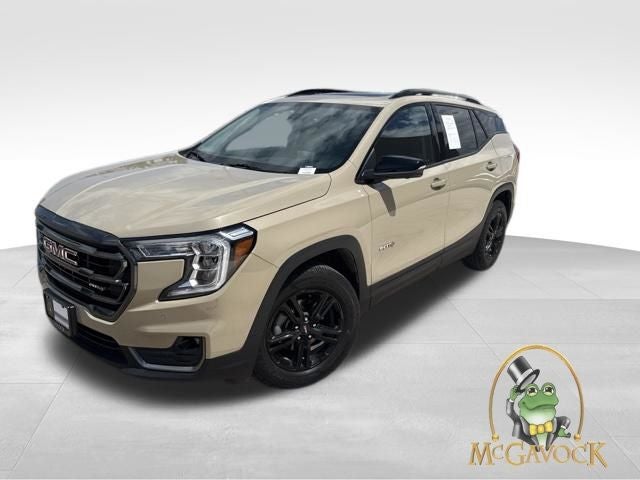 2023 GMC Terrain AT4 in Desert Sand Metallic — front three-quarter view