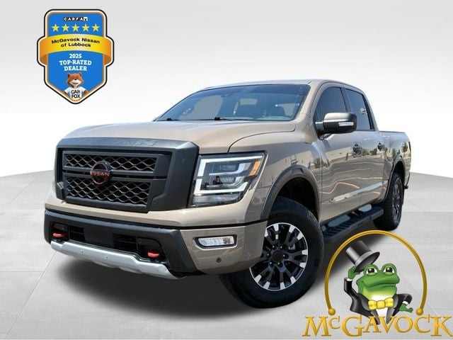 2024 Nissan Titan PRO-4X in Baja Storm — front three-quarter view