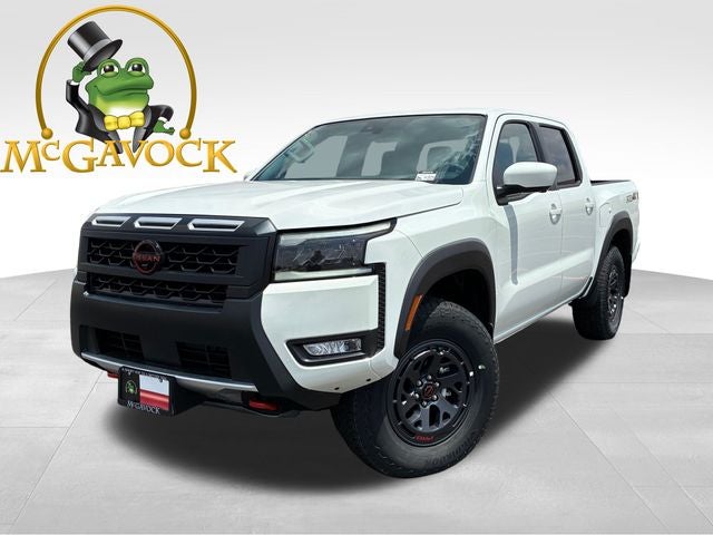 2026 Nissan Frontier PRO-4X in Glacier White — front three-quarter view