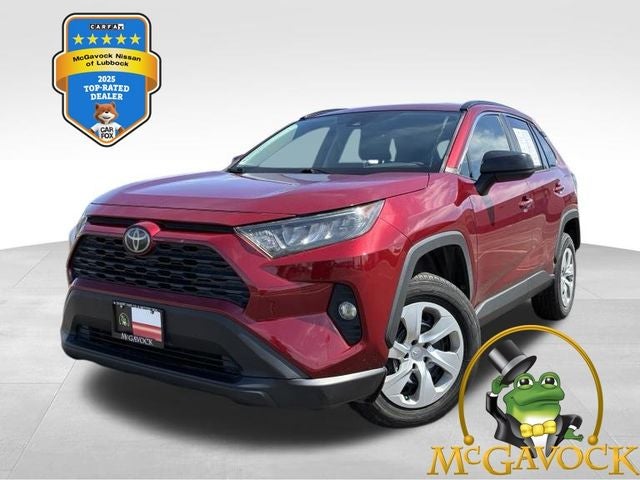 2019 Toyota RAV4 LE in Ruby Flare Pearl — front three-quarter view