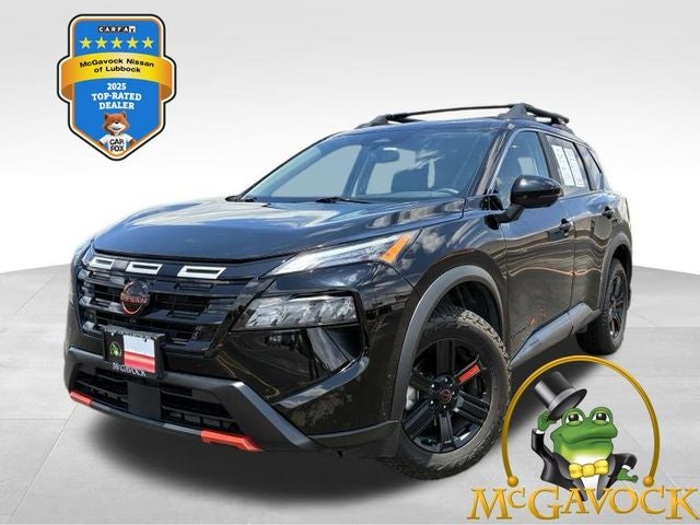 2025 Nissan Rogue Rock Creek in Super Black — front three-quarter view