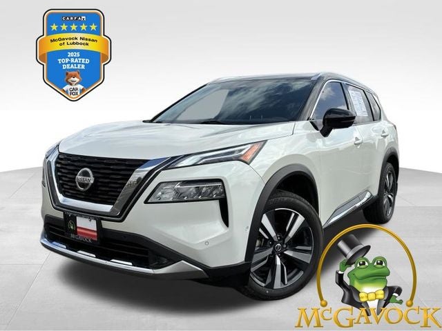 2021 Nissan Rogue Platinum in Pearl White Tricoat/Super Black — front three-quarter view