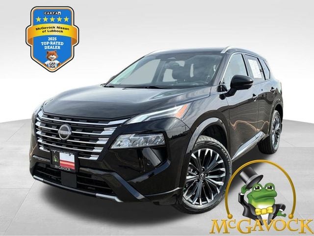 2024 Nissan Rogue Platinum in Super Black — front three-quarter view