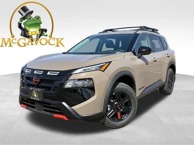 2026 Nissan Rogue Rock Creek in Baja Storm Metallic — front three-quarter view