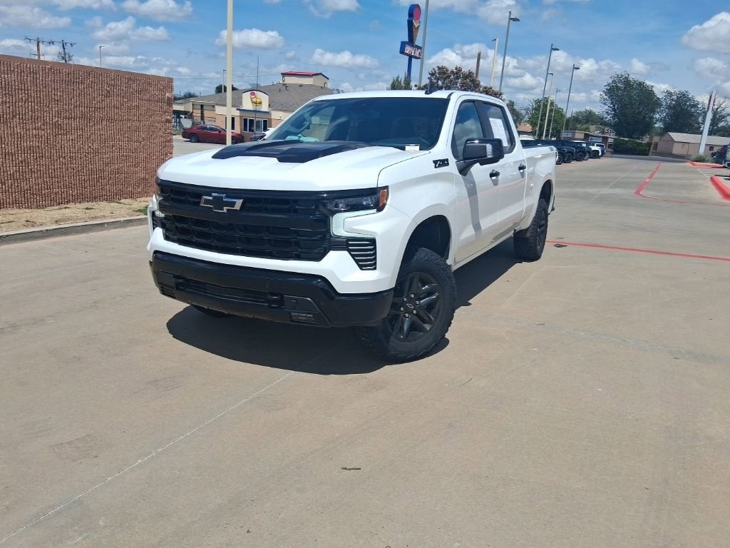 2026 Chevrolet Silverado 1500 LT Trail Boss in Summit White — front three-quarter view